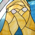 praying hands - stain glass